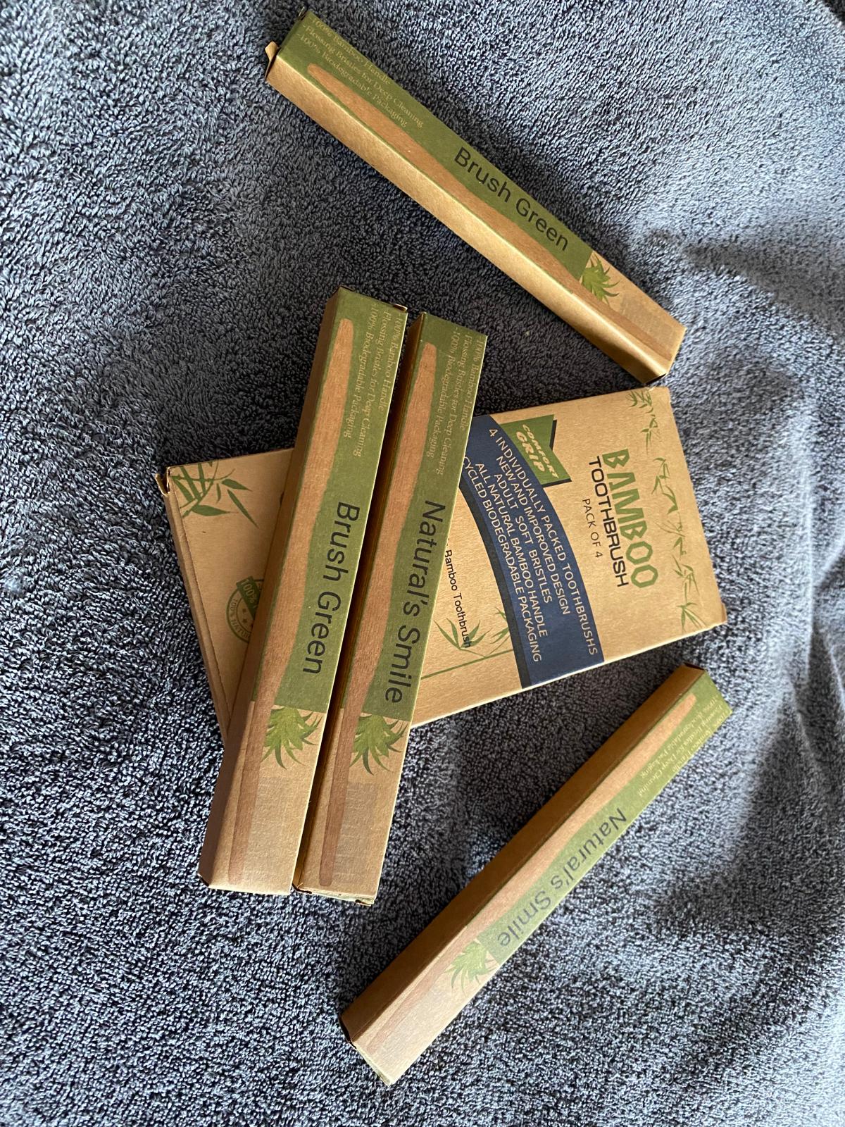 Experience a superior clean with our premium eco-friendly bamboo toothbrush pack featuring soft, flossing bristles for optimal oral care. pack of  4